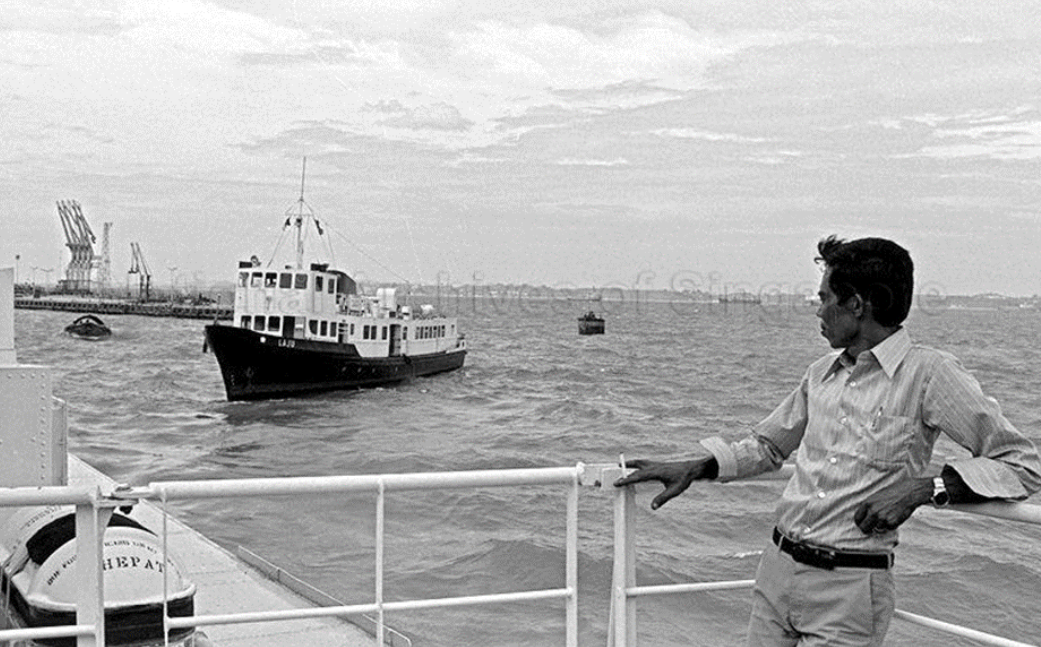 An image of the Laju ferry with Ulot bin Idris in the foreground.